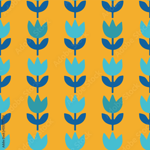 A vibrant yellow and blue floral pattern with blue flowers is displayed. The flowers are arranged in a row, with each one being a different shade of blue and yellow. The pattern is full of life