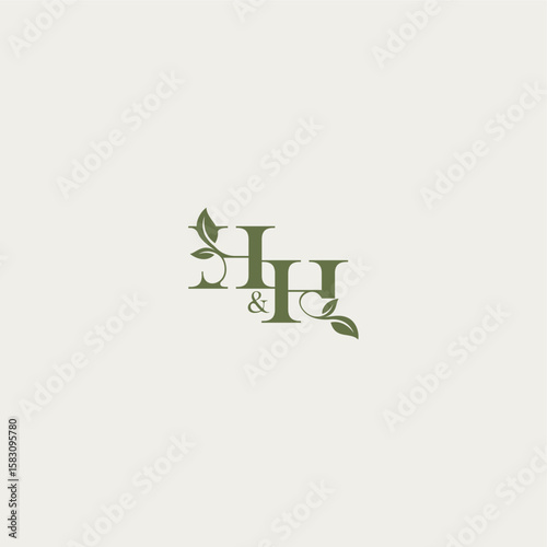 organic leaf logo bold initial concept letter luxury wedding monogram design HH