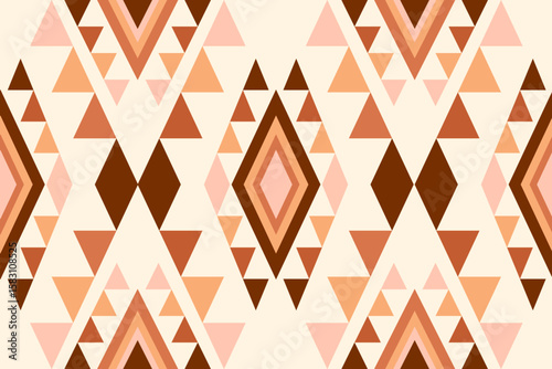 Seamless geometric pattern featuring brown orange and pink triangles and diamonds on a light beige background