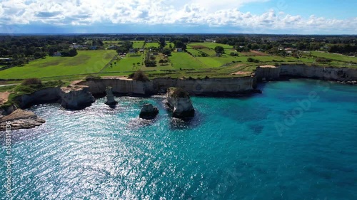 Faraglioni di Sant'Andrea - Torre Sant'Andrea, Salento, Lecce, Apulia, Italy - Aerial view of the rocks from the sea