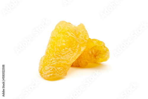Dried dehydrated pear fruits arranged artistically on a clean white background, showcasing their vibrant yellow color and unique wrinkled texture for culinary and health applications