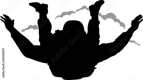 Silhouette of a skydiver with arms and legs outstretched against a cloudy sky in a dynamic composition