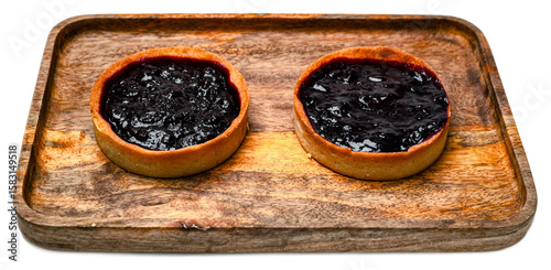 Mini berry jam tart with rustic shortcrust pastry shell isolated on transparent background