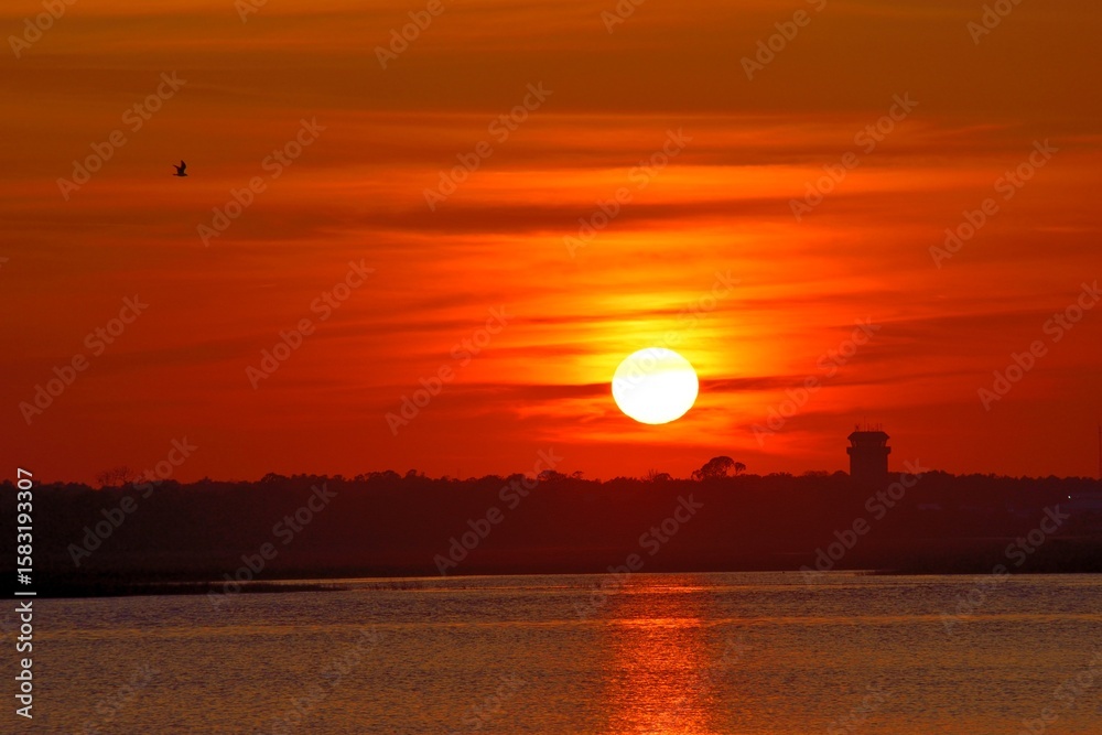 Fototapeta premium sunset over the river