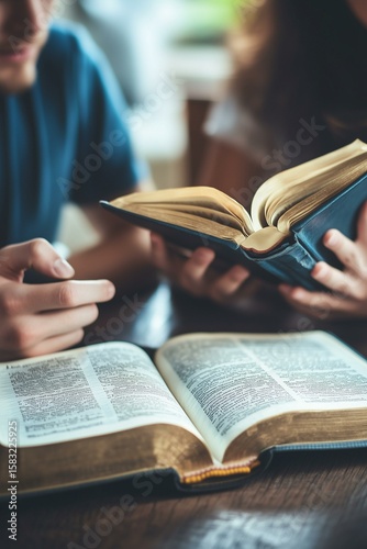 Christian couple or group reading study the bible together and pray at a home or Sunday school at church. concept studying the word of god.