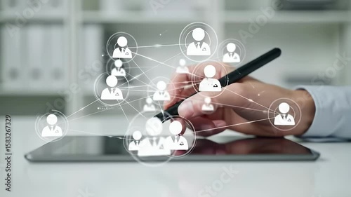 Wallpaper Mural Hand Using Digital Pen on Tablet with Social Network Connection Icon on White Desk in Bright Office with White Bookshelf Network Structure Torontodigital.ca