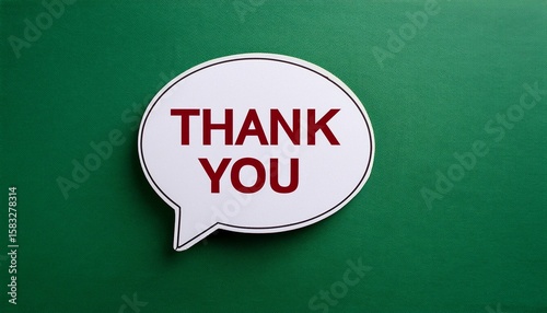 white speech bubble with thank you message on green background expression of gratitude