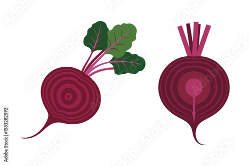 Whole and halved beetroots with green leaves vegetable food