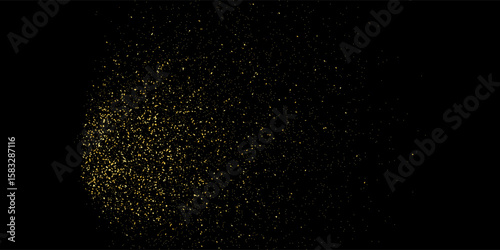 Gold glitter texture on a black background. Golden explosion of confetti. Golden grainy abstract texture on a black background. Design element
