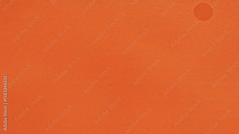 Fototapeta premium Distressed texture overlay on a vibrant orange backdrop