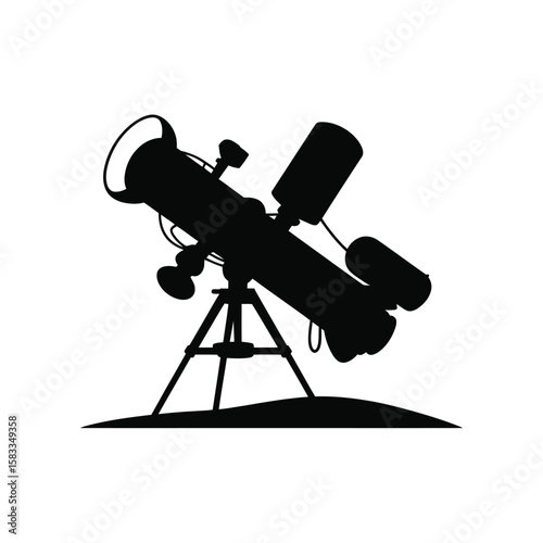 Silhouette of a telescope on a tripod pointed towards the sky