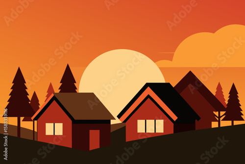 sunrise illuminating small cottage roofs