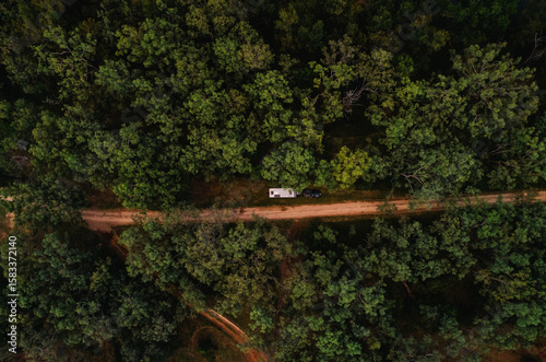 Wallpaper Mural Car with caravan pulled off to the side of dirt trail in forested area in rural NSW Australia Torontodigital.ca