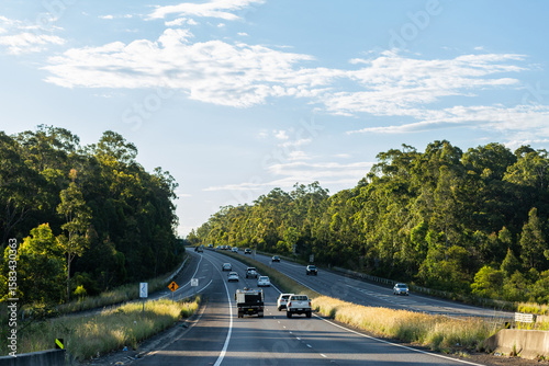 traffic traveling on divided highway road passing on ramp in NSW Australia