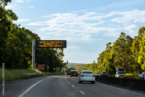 wear a seatbelt correctly penalties apply on digital highway sign during seatbelt safety campaign