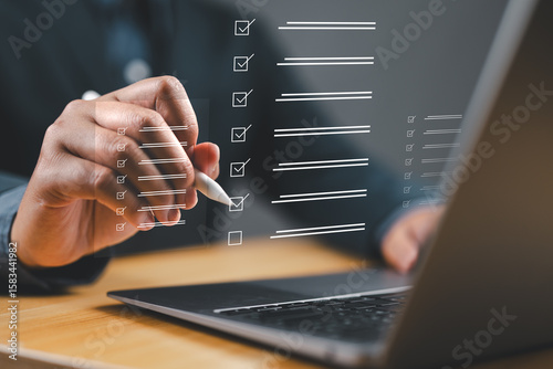 Tableau sur toile Business performance checklist, businessman checklist survey, filling out digital form checklist, take an assessment, questionnaire, evaluation, online survey, online exam