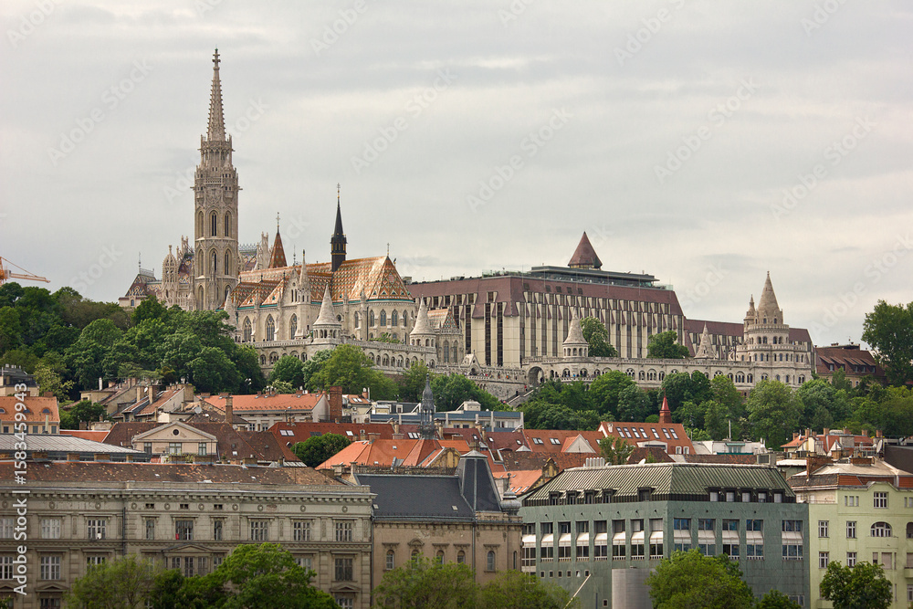 Fototapeta premium View of the Fisherman's Bastion and St Matyas Church on the banks of the Danube in Budapest Hungary