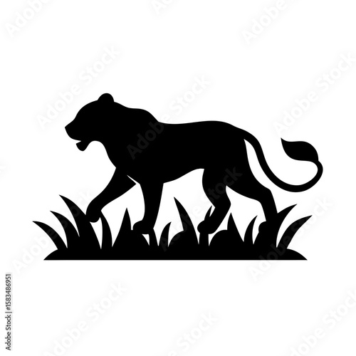 Black silhouette of a lion prowling through dense vegetation