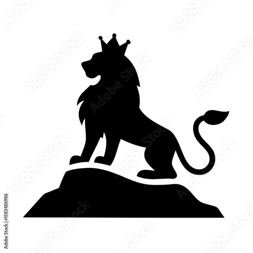 Silhouette of a majestic lion perched on a rock with vast view