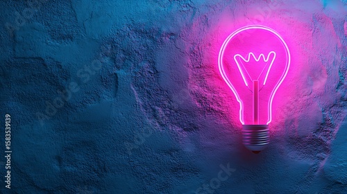 Neon pink lightbulb against a textured blue wall