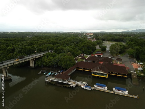 Wallpaper Mural Morning traffic on bridge with river and mangrove area. Torontodigital.ca