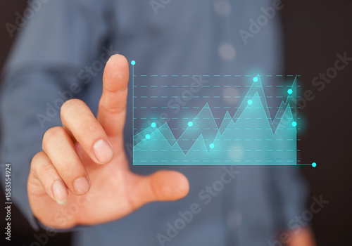 Hand holding graph with percentage, special offer of shopping department store discount and tax concept, adjusting interest rates, raising interest rates to fight inflation, returns on investments.