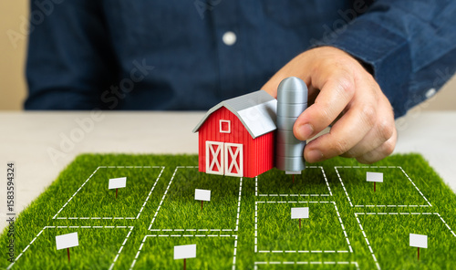 Foto A man decides which plot of land to buy for a farm