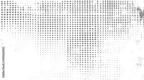 Grunge halftone dots background. Abstract retro pop art dot pattern with rough edges. Vintage distressed comic overlay texture.