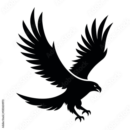 Black silhouette of a hawk with wings spread descending isolated on white background