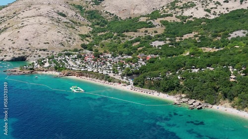 Campsite at Campig Skrila, Krk Island, Stara Baska Croatia, Aerial View of the Mountains and Coast With Boats, Beaches and Adriatic Sea.  The Seaside Rv Campmobiles on a Summer Beautiful Coastline