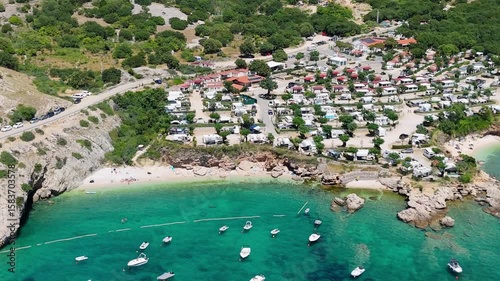 Campsite at Campig Skrila, Krk Island, Stara Baska Croatia, Aerial View of the Mountains and Coast With Boats, Beaches and Adriatic Sea.  The Seaside Rv Campmobiles on a Summer Beautiful Coastline