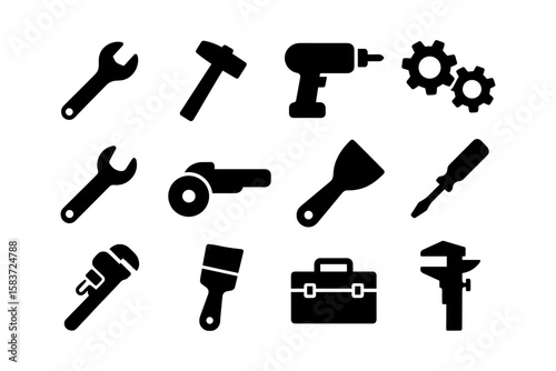 Set of black silhouette tools icons including wrench and hammer for construction