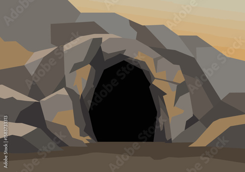 A dark gaping cave entrance framed by jagged rocks of gray tan and brown