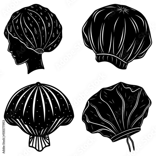 Four black and white shower caps in various styles with different patterns and textures displayed neatly here