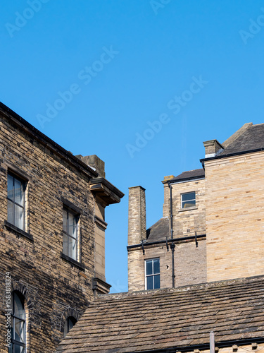 group of typical 19th century old industrial stone buildings in the little germany district of bradford