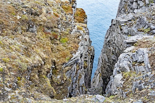A precipitous gap in the dramatic cliffs at the North Cape in Norway.