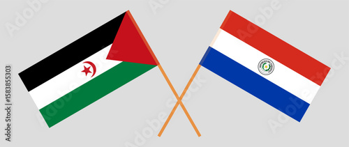 Crossed flags of Western Sahara and Republic of Paraguay. Official colors. Correct proportion. Vector illustration