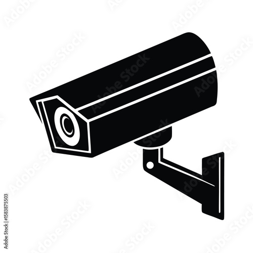 Modern security camera mounted on a wall for surveillance silhouette