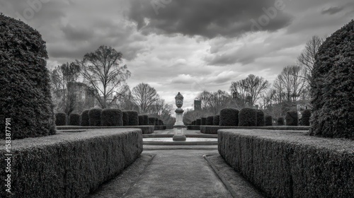 Formal garden pathway with topiary