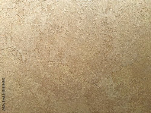 Elegant gold and beige venetian plaster texture, decorative metallic stucco surface, seamless luxury background for wall design, branding, packaging and architecture visuals.