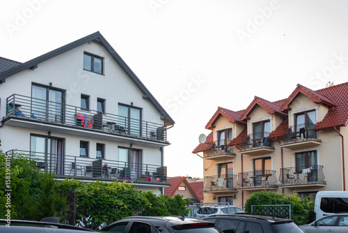 Facade of a house with balconies. Modern balcony. Facade of a building.