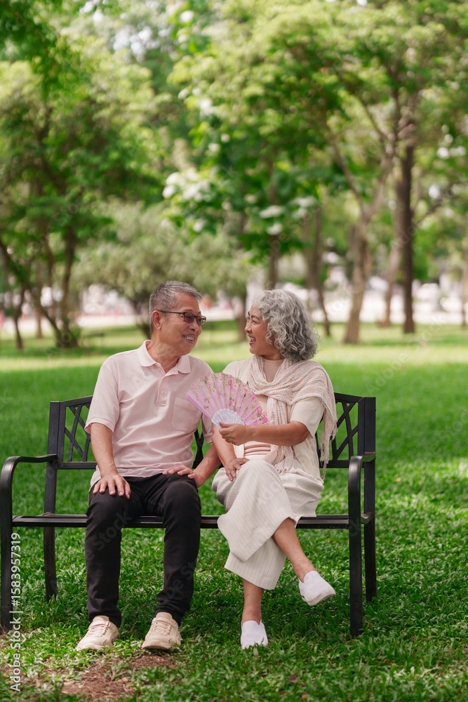 Asian Older Couple Enjoying Retirement Sitting Park Bench Green Garden Happy Leisure Time Together Senior Lifestyle Wellbeing Asian Older Couple Enjoying Retirement Sitting Park Bench Green Garden Happy Leisure Time Together Senior Lifestyle Wellbeing