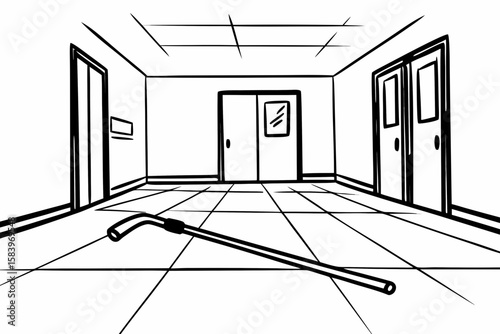 A white cane lies on the floor of a hospital hallway