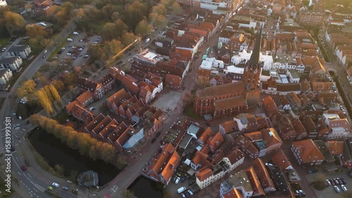 Aerial view around the old town of the city Buxtehude on a sunny autumn afternoon in Germany.	