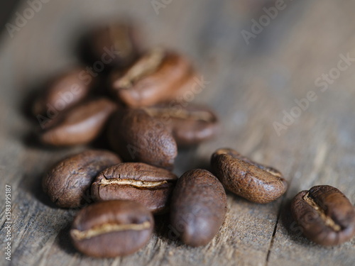 Coffee Beans On Rustic Wood Surface