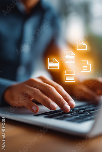 Businessman using laptop with digital invoice icons, representing e-invoicing, billing automation, financial technology, online payment, accounting software, ERP system, and paperless finance process.