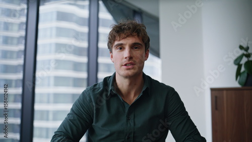 Fotografie Manager greeting video meeting in office pov shot closeup