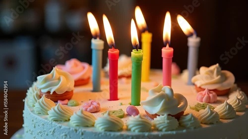 Delightful birthday cake with burning candles, a sweet treat for celebration and joyful event occasion moments.