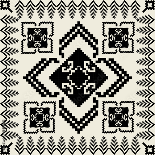 Black and white tribal pixel pattern with geometric diamond and floral motifs