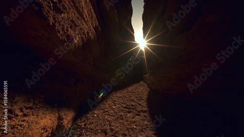 Sunlit Desert Canyon Pathway.